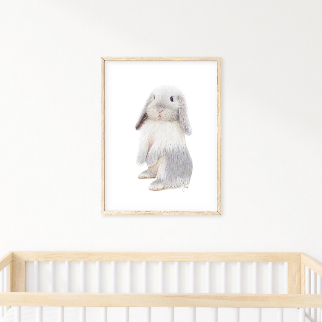 Framed print of Chester above a wooden cot