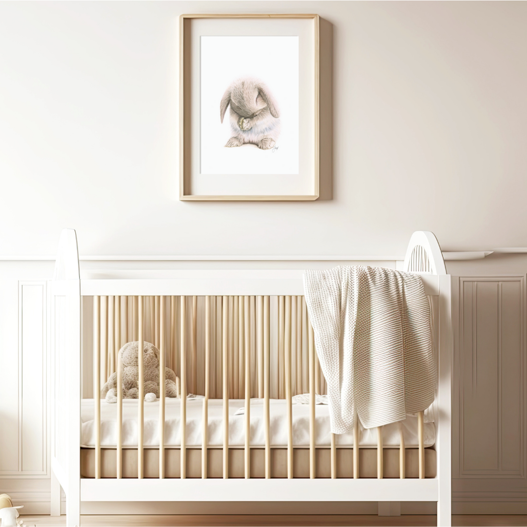 Framed print of Coco the bunny on a warmly lit nursery wall